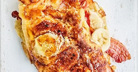 Kroasany, stuffed with crispy bacon and ripe banana, in French toast style