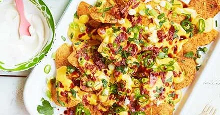 Nachos with Crispy Bacon and Creamy Cheese Sauce