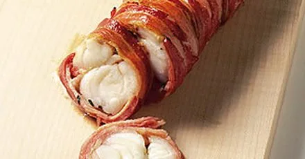 Monkfish fillet wrapped in crispy bacon