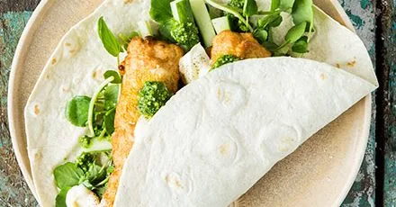 Haddock in crispy batter with aromatic pesto in a tortilla wrap
