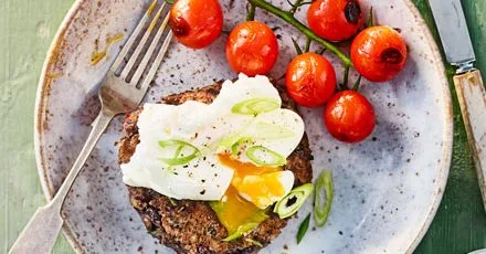 Black bean and barley cakes with poached eggs