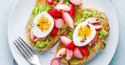 Open‑faced sandwich with boiled egg, avocado and quick‑pickled radish