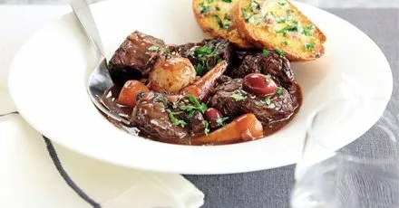 Braised beef with anchovy toasts