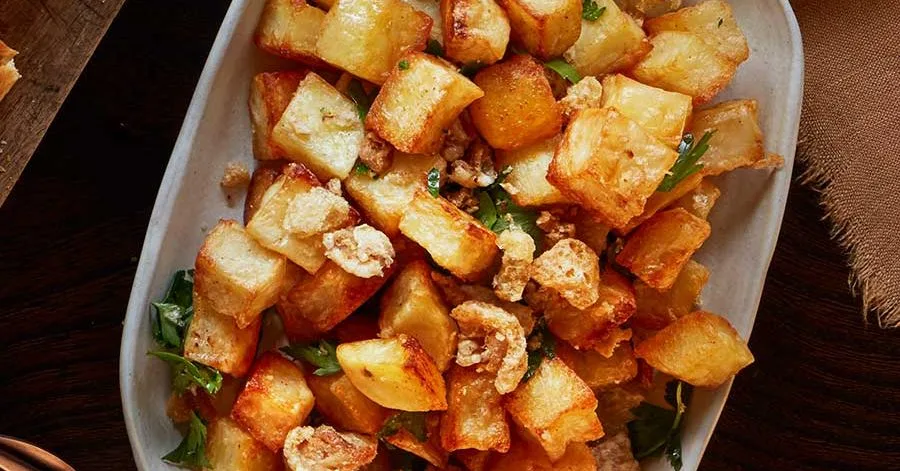 Brown butter roasted potatoes with pork crumbs