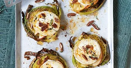 Cabbage steaks with apple, goat’s cheese & pecans