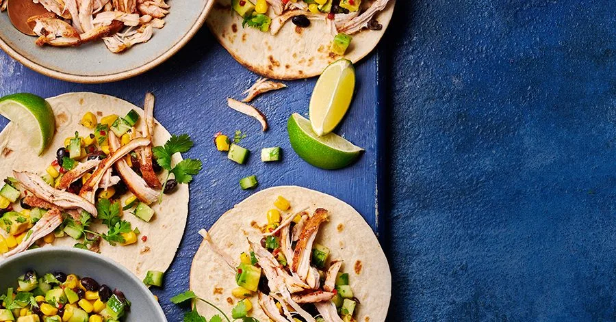 Cajun pulled chicken tacos with black bean salad