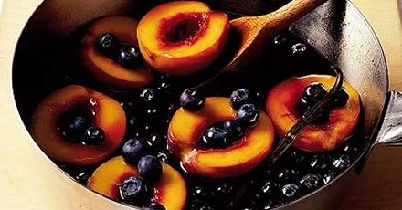 Caramel poached peaches with blueberries