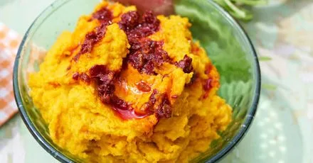 Carrot humus with cumin and swirled harissa