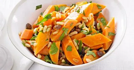 Carrots with pine nuts, raisins & parsley