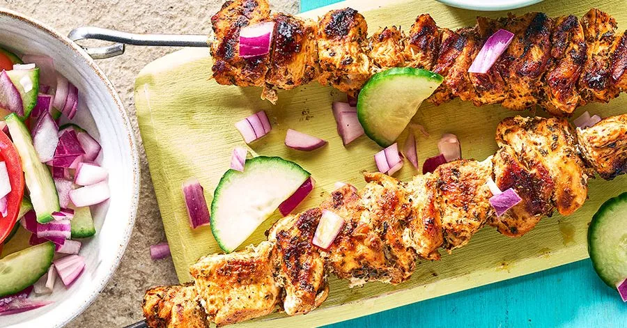 Chicken skewers with broad bean hummus