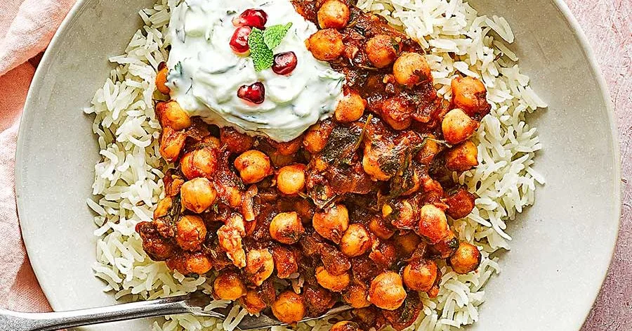 Chole with cumin rice and raita