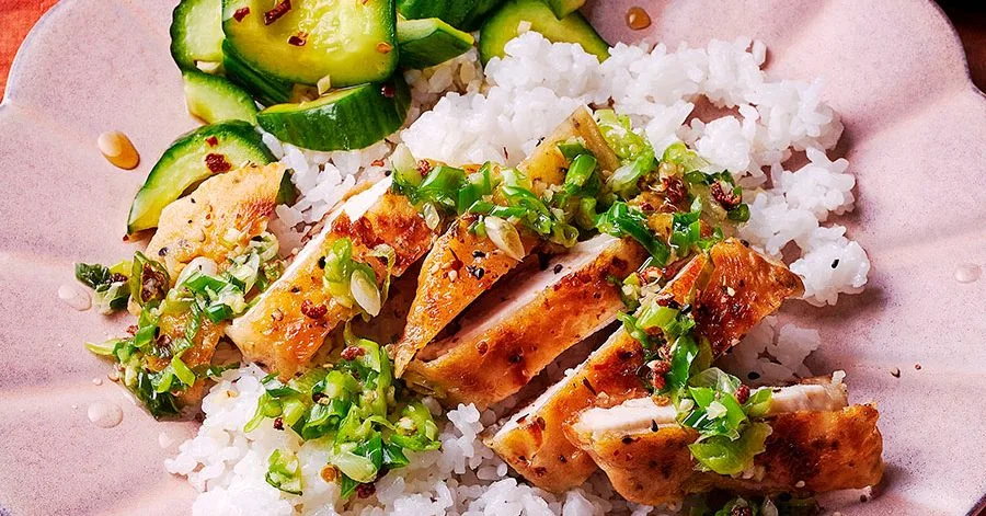 Crispy chicken bowl with spring onion and ginger oil