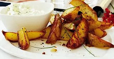 Crispy potato skins with creamy chive dip