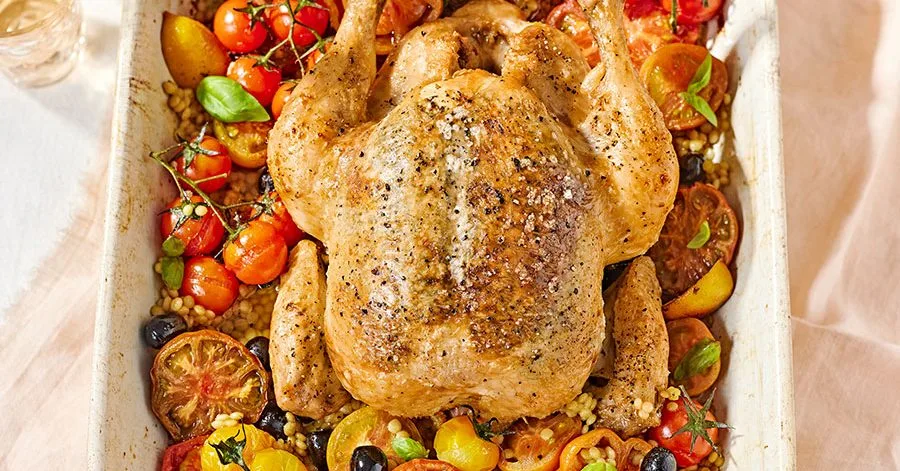 Запечена курка в часниковому маслі з томатами та кускусом