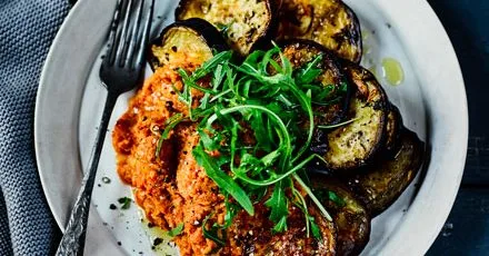 Garlicky aubergine steaks with romesco sauce