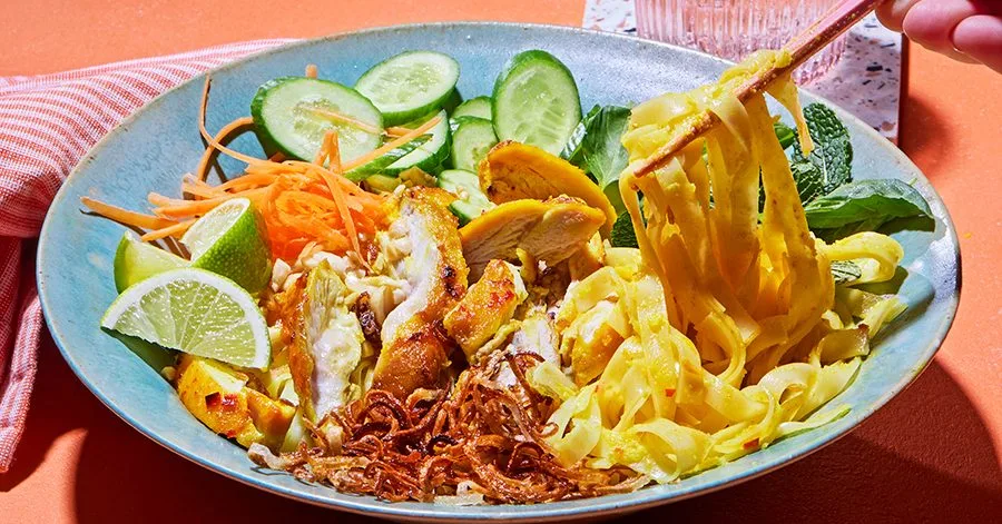 Golden chicken with rice noodles & crispy shallots