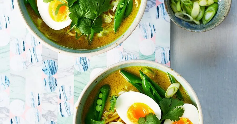 Golden noodle soup with soft-boiled eggs