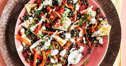 Griddled squid, lentil, roast pepper & preserved lemon with tahini