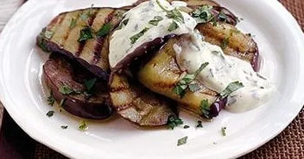 Grilled aubergine with creamy dressing