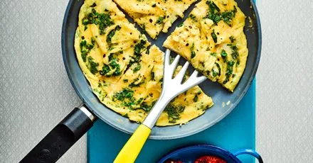 Herb omelette with fried tomatoes