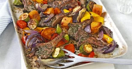 Herbed lamb cutlets with roasted vegetables
