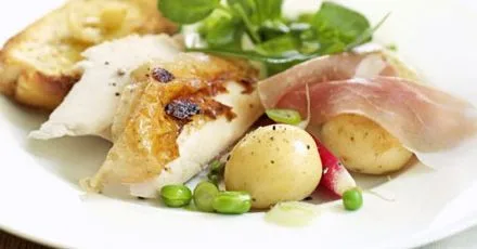 Herby roast chicken with garlic lemon toasts