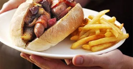 Hotdogs with sticky roasted onions