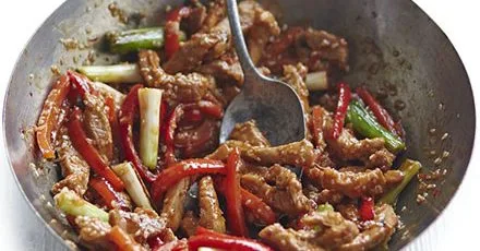 Корейське свиняче стир‑фрай з кунжутом