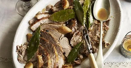 Roast lamb shoulder with bay leaves and juniper