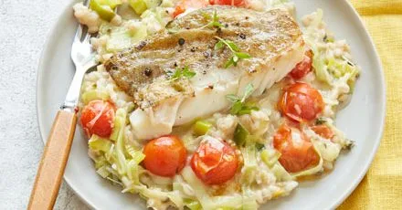 Leek, tomato & barley risotto with pan-cooked cod