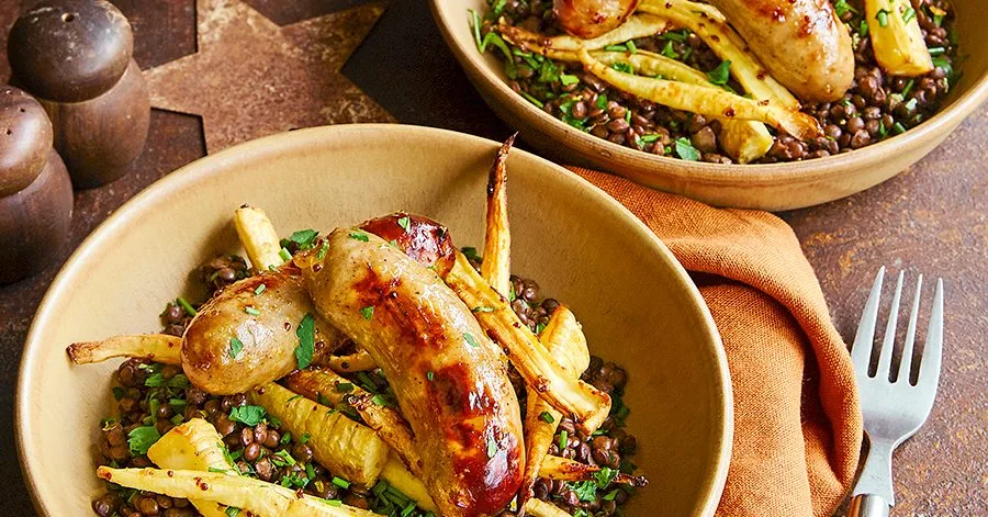 Maple-glazed sausages & parsnips with herby lentils