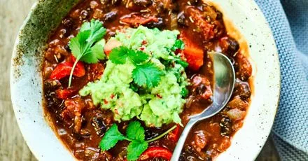 Mexican bean soup with guacamole