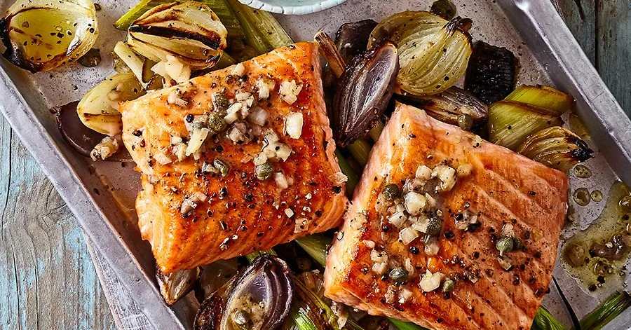 One-pan roast salmon with leeks, onions & parsley dressing