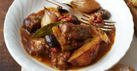 One-pot pork with orange, olives & bay