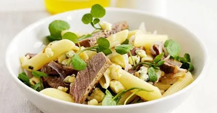 Penne with griddled steak, stilton & shallots
