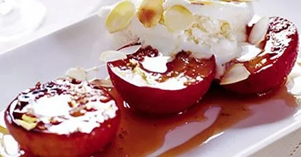 Peppered plums with almond ice