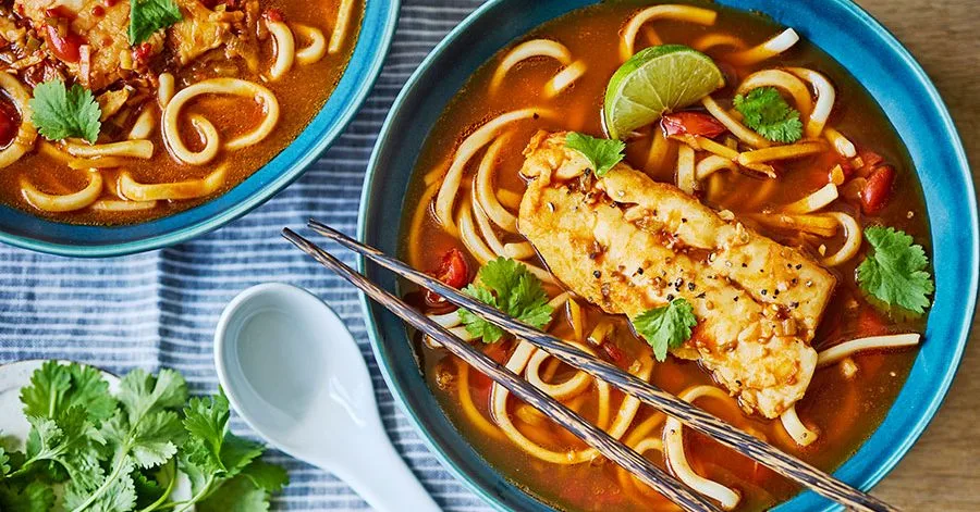 Poached hake in tomato, chilli & ginger broth