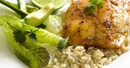 Red spiced fish with green salad