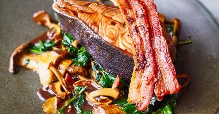 Red wine poached halibut with bacon & mushrooms