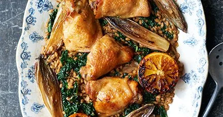 Roast chicken with oranges, chicory & spelt