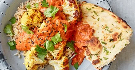 Roasted cauliflower with tomato & cashew sauce