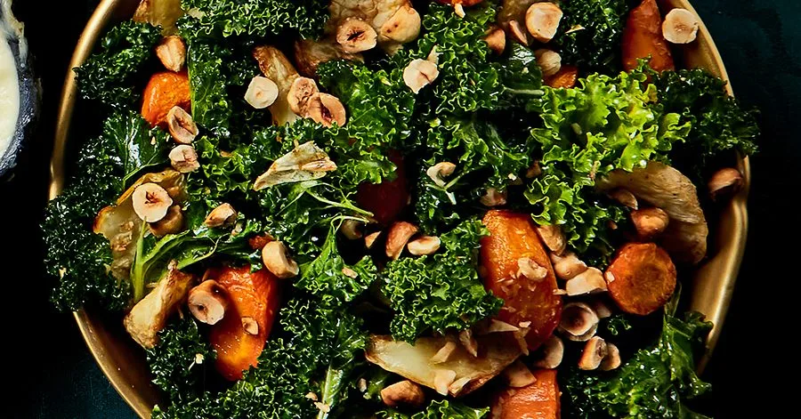 Roasted celeriac & carrots with kale & hazelnuts