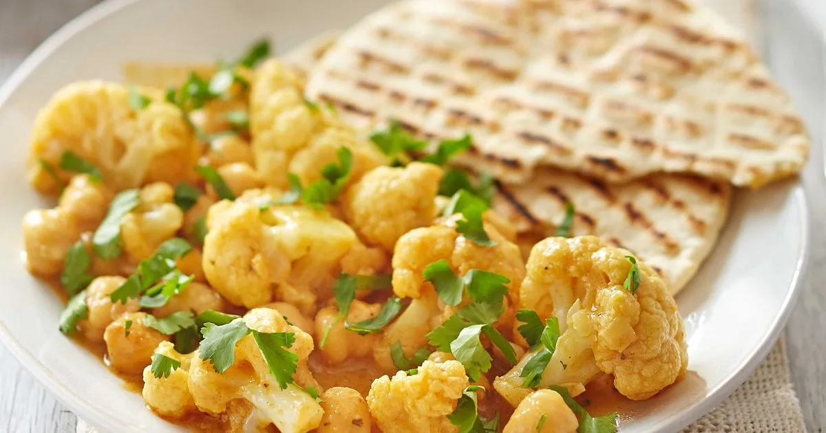 Satay cauliflower & chickpea curry with storecupboard flatbreads