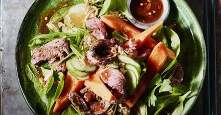 Seared beef & papaya salad with tamarind soy dressing