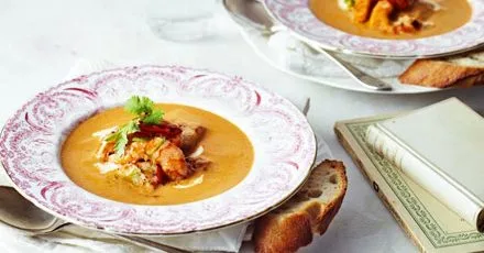 Seared garlic seafood with spicy harissa bisque