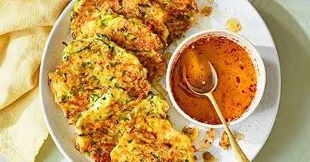 Sesame, halloumi & courgette fritters with chilli honey drizzle