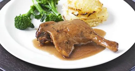 Slow-cooked duck legs in Port with celeriac gratin