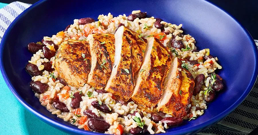 Spicy chicken with coconut rice & beans