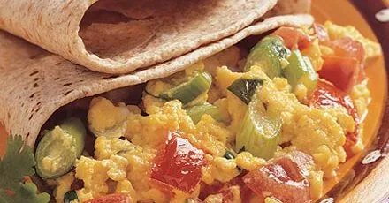 Spicy scrambled eggs with chapatis