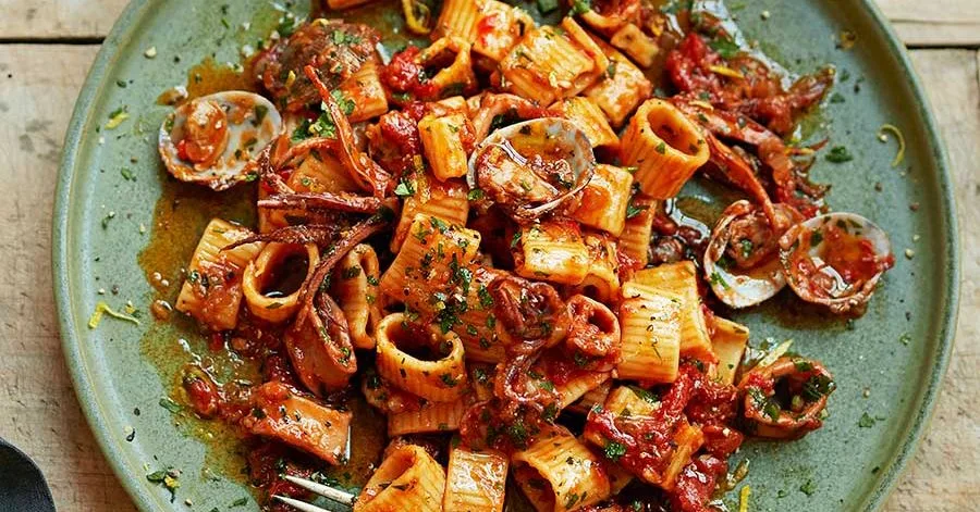 Spicy squid ragu with pasta & clams